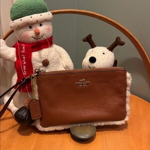 SOLD………NOT AVAILABLE….Coach Sherpa Wristlet F64709
